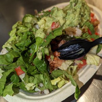 Chipotle Mexican Grill - Chicken with brown rice. Veggies on top - Mexican Near Me - Aventura, Florida