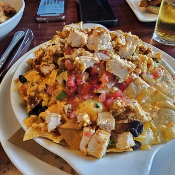 Sitting Duck Tavern - Nachos with Cajun chicken - Bars Near Me - Trumbull, Connecticut Sitting Duck Tavern - Nachos with Cajun chicken - Bars Near Me - Trumbull, Connecticut