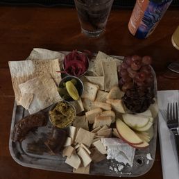 One of the several options of smoked sausage and the truffle goat cheese. A great light meal. One of the several options of smoked sausage and the truffle goat cheese. A great light meal.