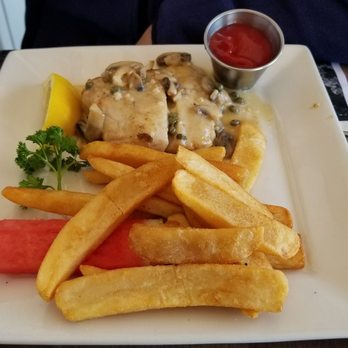 Steve's Steakhouse - Catch of the day- seabass with white wine, caper, butter reduction and side fries - Steakhouses Near Me - Avalon, California
