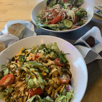 Café Zupas - two bowls of salad on a table - Soup Near Me - West Valley, Utah