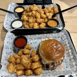 The Albatross Golf Pub - Top: Basket of tots w/sauces. Bottom: The Classic burger (double beef smashy, cheese, zesty aioli, house pickles, hold onions), June 2025.