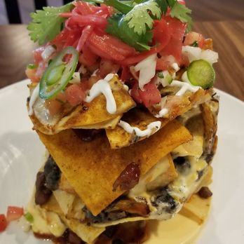 Guy Fieri's Branson Kitchen + Bar - Trashcan nachos - Bars Near Me - Branson, Missouri Guy Fieri's Branson Kitchen + Bar - Trashcan nachos - Bars Near Me - Branson, Missouri
