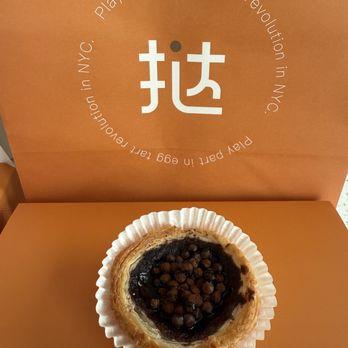 Na Tart - Chocolate bobo ($3.95): This had a delicious chocolate filling, and I loved the dark chocolate crunchy pearls on top. - Bakeries Near Me - San Diego, California Na Tart - Chocolate bobo ($3.95): This had a delicious chocolate filling, and I loved the dark chocolate crunchy pearls on top. - Bakeries Near Me - San Diego, California