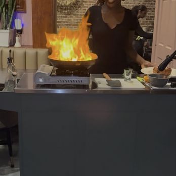 Dorothy's Downtown - Dark rum & banana liqueur are over the mixture and ignited, creating a dramatic, caramelized flame before serving hot. - Cocktail Bars Near Me - Jacksonville, Florida Dorothy's Downtown - Dark rum & banana liqueur are over the mixture and ignited, creating a dramatic, caramelized flame before serving hot. - Cocktail Bars Near Me - Jacksonville, Florida