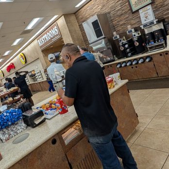 Buc-ee's - Interior Store with Restrooms Sign in the Background - Convenience Stores Near Me - Bastrop, Texas