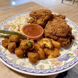 Louisiana Famous Fried Chicken - 3 piece combo with corn fritters, fried okra, coke slaw and some jalapeños and hot sauce for that extra kick.