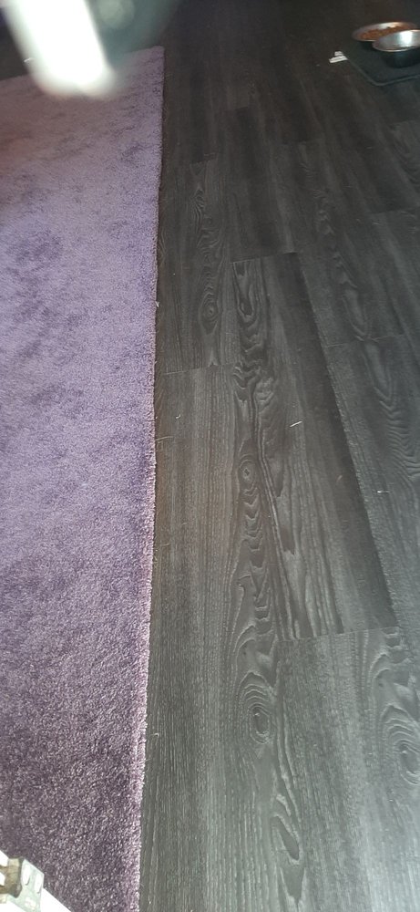 Slide of Ducks Roofing & Construction