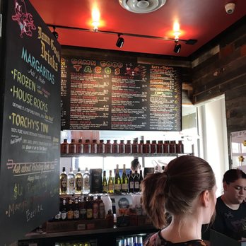 Torchy's Tacos - Menu board in cashier angle - Tex-Mex Near Me - Fort Worth, Texas