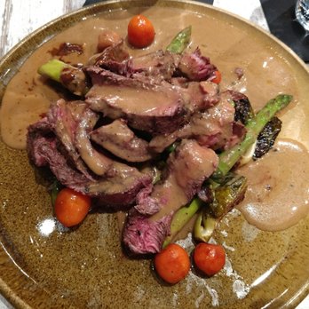 Cork And Flame - Flank steak - very tender.  Peppercorn sauce on top. - Tapas Bars Near Me - Evans, Georgia