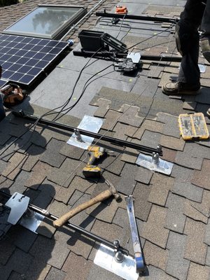 Quiroz And Sons Roofing Logo