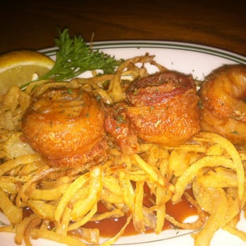 RT's Restaurant - Scallop wrapped bacon over fried onions with a steamed cane syrup reduction - Cajun/Creole Near Me - Alexandria, Virginia RT's Restaurant - Scallop wrapped bacon over fried onions with a steamed cane syrup reduction - Cajun/Creole Near Me - Alexandria, Virginia