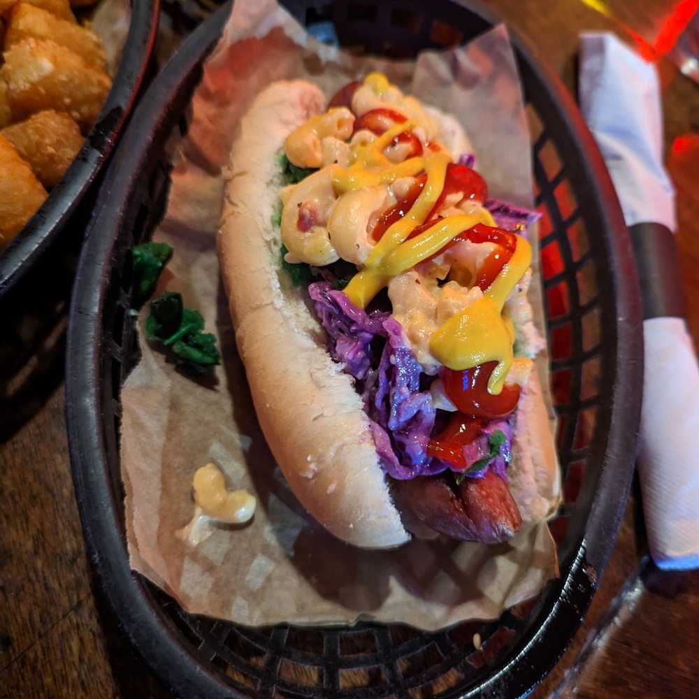 Happy Dog - Pimento mac and cheese, blue cheese coleslaw, alien relish, ketchup and mustard - Bars Near Me - Cleveland, Ohio Happy Dog - Pimento mac and cheese, blue cheese coleslaw, alien relish, ketchup and mustard - Bars Near Me - Cleveland, Ohio