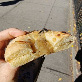 Russ & Daughters - Bialy with butter - Bagels Near Me - New York, New York
