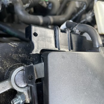 Firestone Complete Auto Care - Picture of the plastic they broke - Auto Repair Near Me - Cypress, Texas Firestone Complete Auto Care - Picture of the plastic they broke - Auto Repair Near Me - Cypress, Texas
