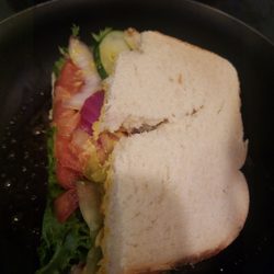 Lolas Delicatessen - Sandwich on suspicious sourdough bread.
