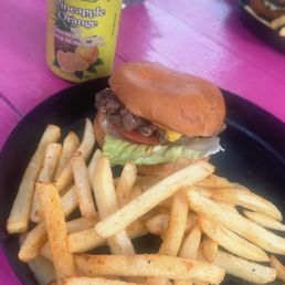 Cheeseburger and fries and an Aloha pineapple Orange drink