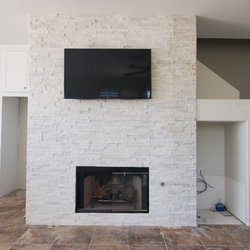 M Resendiz Tile & Marble - Framed and tiled fireplace