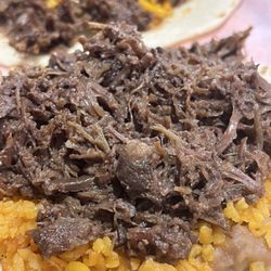 La Vaquita Meat Market - Slap Yo Momma Good Barbacoa Taco with rice n beans.