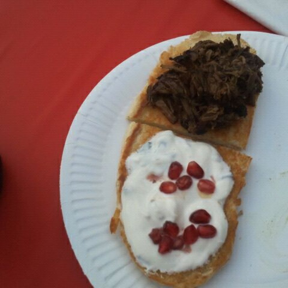 Glasgow Street Feastival - slow roasted pomegranite  pulled lamb with mint yogurt from Roast. - yuuuuum says my non-vegetarian companion - Festivals Near Me - Glasgow, GLG