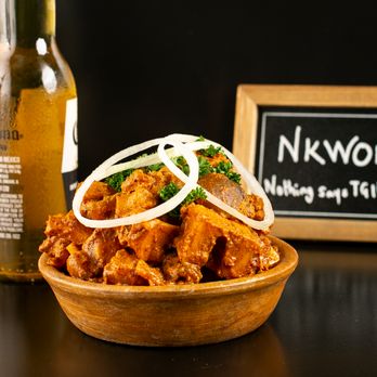 Lagos Buka - Nkwobi - Cut-up beef legs cooked in creamy sauce bursting with local flavors. A highly sought-after street food favorite! - Comfort Food Near Me - Katy, Texas Lagos Buka - Nkwobi - Cut-up beef legs cooked in creamy sauce bursting with local flavors. A highly sought-after street food favorite! - Comfort Food Near Me - Katy, Texas