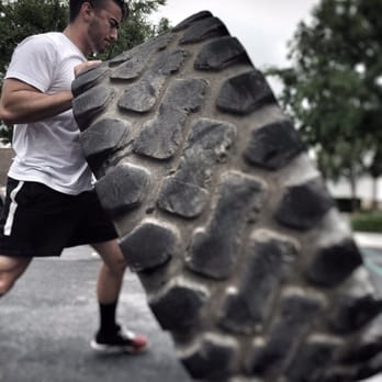 Brute - Zach flipping tires and running sprints - Trainers Near Me - Mission Viejo, California Brute - Zach flipping tires and running sprints - Trainers Near Me - Mission Viejo, California