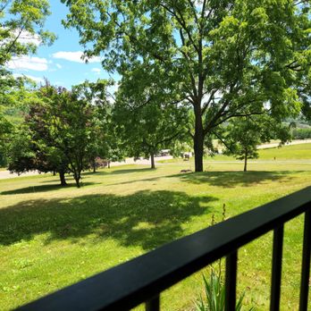 Yates Cellars - a view of a park from a balcony - Wineries Near Me - Keuka Park, New York