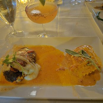 Chatham's Place Restaurant - Chicken a la Bruce, with homemade mozzarella, served alongside a jumbo ricotta cheese ravioli. - Desserts Near Me - Orlando, Florida