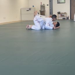 Jordan rotates the kids throughout class to show proper technique. Jordan rotates the kids throughout class to show proper technique.