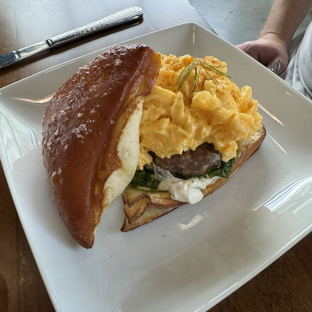 Ovenbird - Sausage/Boursin/Pesto Breakfast Sandwich - Modern European Near Me - Austin, Texas Ovenbird - Sausage/Boursin/Pesto Breakfast Sandwich - Modern European Near Me - Austin, Texas