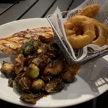 Evolve Brewing by Aces & Ales - Salmon, Those Damn Beer Battered Onion Rings, Brussels Sprouts - Beer Bar Near Me - Las Vegas, Nevada Evolve Brewing by Aces & Ales - Salmon, Those Damn Beer Battered Onion Rings, Brussels Sprouts - Beer Bar Near Me - Las Vegas, Nevada