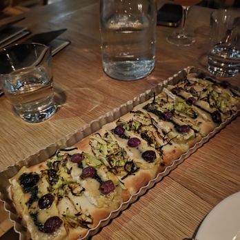 Black Bottle - Brie and Leek Flatbread - New American Near Me - Bellevue, Washington Black Bottle - Brie and Leek Flatbread - New American Near Me - Bellevue, Washington