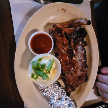 Daisy Mae's Steakhouse - Ribs, baked potato, butter - Steakhouses Near Me - Tucson, Arizona