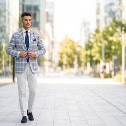 Tom's Place - A statement in pattern. A sharp windowpane sport coat that effortlessly bridges the gap between casual and formal.