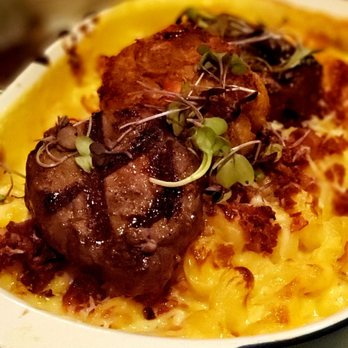 Crave - a plate of food on a table - Gastropubs Near Me - Campbellsport, Wisconsin