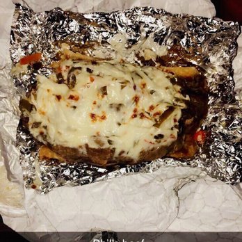 Phil's Pizza - This is a big beef , with mozzarella , hot peppers, and I had it made on garlic bread ! - Pizza Near Me - Oak Lawn, Illinois Phil's Pizza - This is a big beef , with mozzarella , hot peppers, and I had it made on garlic bread ! - Pizza Near Me - Oak Lawn, Illinois