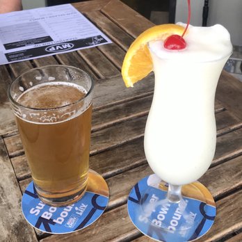 My Village Pub - "Blonde" Beer, Pina Colada...Great Drinks! - New American Near Me - Siesta Key, Florida My Village Pub - "Blonde" Beer, Pina Colada...Great Drinks! - New American Near Me - Siesta Key, Florida