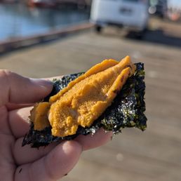 Fresh uni on a seaweed wrapper with a touch of ponzu sauce - PERFECTION