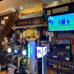 Nolan's - The sign on the front of the bar says Mac's bar
