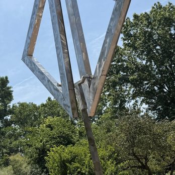 Two Open Triangles Up Gyratory II - Two Triangles - Public Art Near Me - Ann Arbor, Michigan Two Open Triangles Up Gyratory II - Two Triangles - Public Art Near Me - Ann Arbor, Michigan