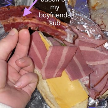 Cafe Lark - Cold uncooked raw bacon vs. cooked bacon on other.   Ham Sub - Pizza Near Me - Albany, New York