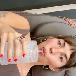 Apple red gel nail. Comfy chairs and beverages