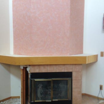 Sullivan Construction Services - a fireplace in a living room - General Contractors Near Me - Frederick, Colorado Sullivan Construction Services - a fireplace in a living room - General Contractors Near Me - Frederick, Colorado