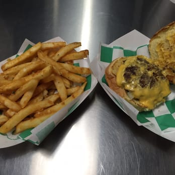 The Mug - Garlic fries ($3.25) and two and change burger ($2.75) - Burgers Near Me - Greenfield, Indiana The Mug - Garlic fries ($3.25) and two and change burger ($2.75) - Burgers Near Me - Greenfield, Indiana