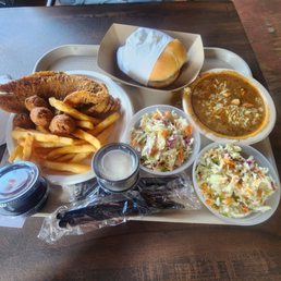 Catfish dinner, Blackened Mahi Sandwich, Seafood Gumbo and Cole Slaw. Catfish dinner, Blackened Mahi Sandwich, Seafood Gumbo and Cole Slaw.
