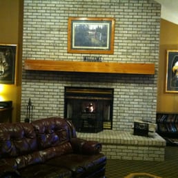 Lobby with comfy leather sofas and fireplace