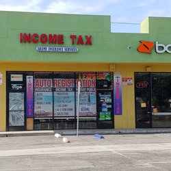 Adame Insurance Services - Parking lot view of office