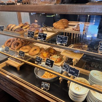 A Thousand Tales - Bakery case with bagels, pretzels, and other pastry items. - Turkish Near Me - Mount Prospect, Illinois