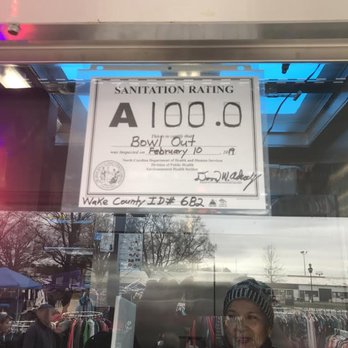 Bowl Out - a sign in the window of a clothing store - Food Trucks Near Me Bowl Out - a sign in the window of a clothing store - Food Trucks Near Me