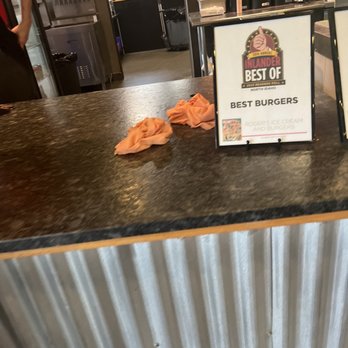 Rogers Ice Cream & Burgers - Used cleaning rags at the ordering counter. Not appetizing as you order - Burgers Near Me - Post Falls, Idaho Rogers Ice Cream & Burgers - Used cleaning rags at the ordering counter. Not appetizing as you order - Burgers Near Me - Post Falls, Idaho